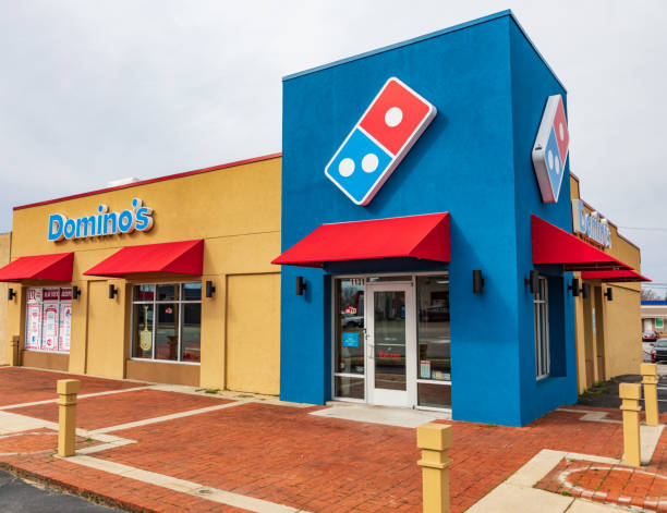 Domino's Pizza store Hickory, NC, USA-2/28/19: A Domino's Pizza, also branded just as "Domino's", is an American pizza chain restaurant with headquarters in Ann Arbor, Michigan. chain store stock pictures, royalty-free photos & images