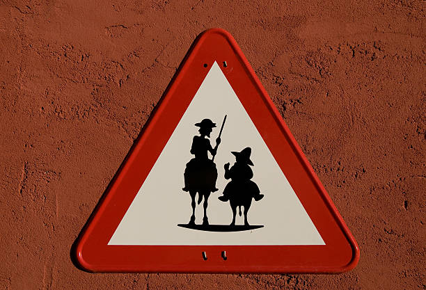 don quijote and sancho panza silhouette in traffic sing - sancho stok fotoğraflar ve resimler