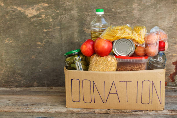 Donation box with food. Donation box with food. food donation stock pictures, royalty-free photos & images