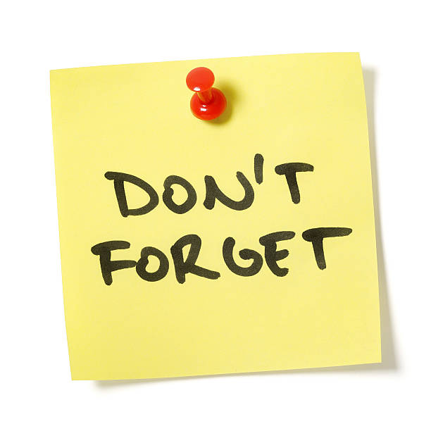 Don't Forget Note Blank yellow sticky note written on "Don't Forget" with red push pin. Isolated on white background with clipping path. reminder stock pictures, royalty-free photos & images