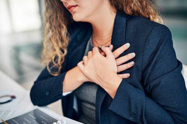 77 Young Woman With Holding Chest Pain On Heart Stock Photos, Pictures &  Royalty-Free Images - iStock