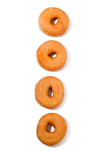 Donuts over white background stock photo