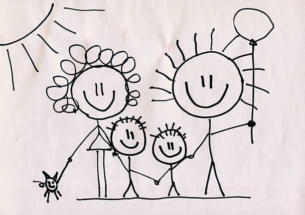 A doodle of a happy family on a piece of paper stock photo