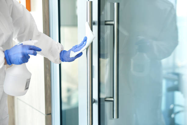 Door and door handle disinfection  disinfection stock pictures, royalty-free photos & images