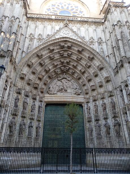 Door of the cathedral Image of the door of the cathedral of Sevilla from the outside seville cathedral stock pictures, royalty-free photos & images