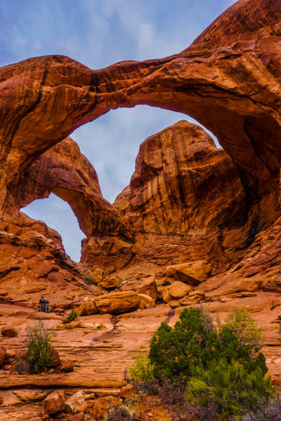 Double Arch Double Arch at Arches NP arches national park stock pictures, royalty-free photos & images