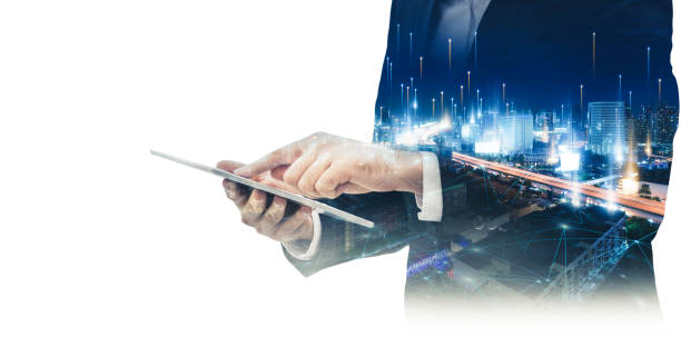 Double Exposure of Businessman Using Tablet With Graphic Media Screen and Cityscape Skyscrapers. Business Technology internet of things and Communication 5G Network Connection Concept stock photo