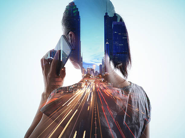 Double exposure of cityscape and smart phone http://i1337.photobucket.com/albums/o665/qinni80125/543534654767876c_zps9455e197.jpg] multiple exposure stock pictures, royalty-free photos & images