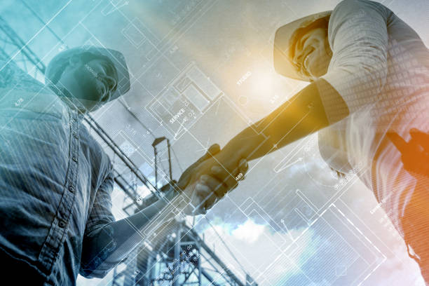 Double exposure of contractors handshaking at a construction site Double exposure of contractors handshaking at a construction site closing a deal with a blueprint in the foreground building contractor photos stock pictures, royalty-free photos & images