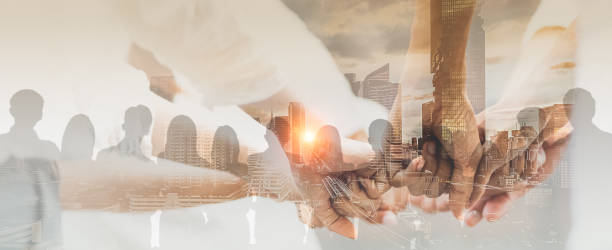 double exposure panoramic teamwork business join hand together with silhouette business people and modern city background. business team standing hands together, volunteer charity work. - conceito imagens e fotografias de stock