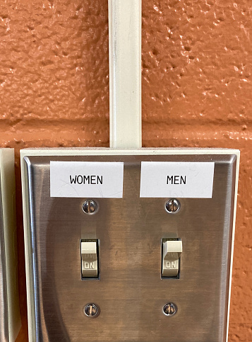 Double Light Switch with Two Labels: Men/Women