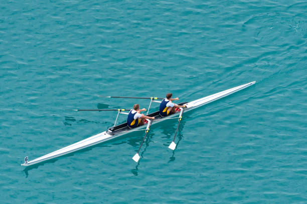 Double Scull Rowing Team Practicing stock photo
