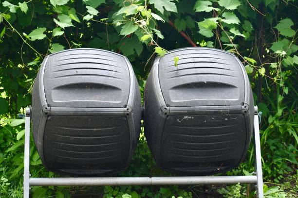 Double Tumbling Compost Bins in the Backyard stock photo