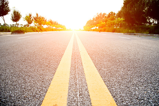 Double Yellow Lines On A Road Stock Photo - Download Image Now - iStock