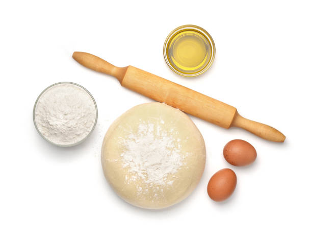 Dough and baking  ingredients Top view of dough and baking  ingredients isolated on white pastry dough stock pictures, royalty-free photos & images