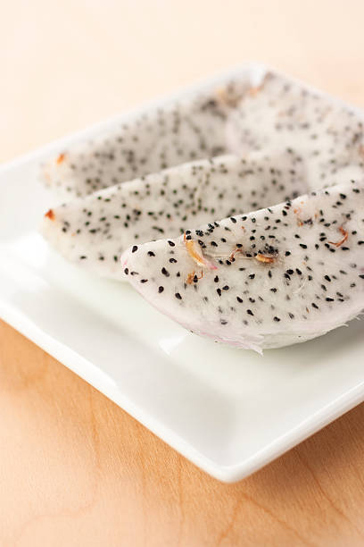 Dragon fruit slices on a plate stock photo