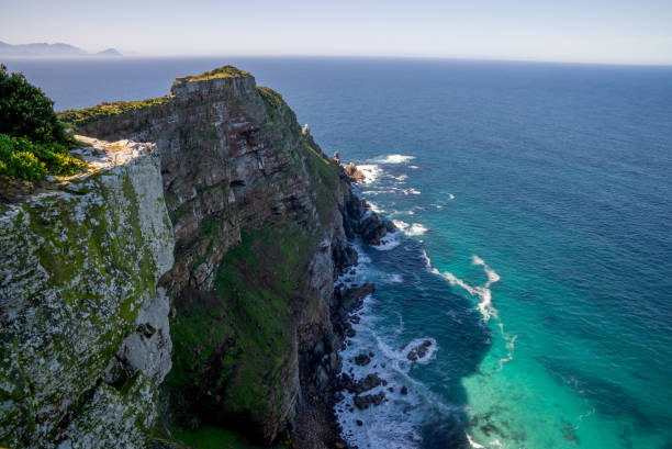 A dramatic view of the jagged rock-face and sheer cliffs of Cape Point. stock photo