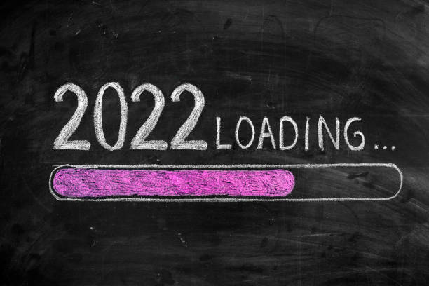 Drawing Loading New Year 2022 on Chalkboard stock photo