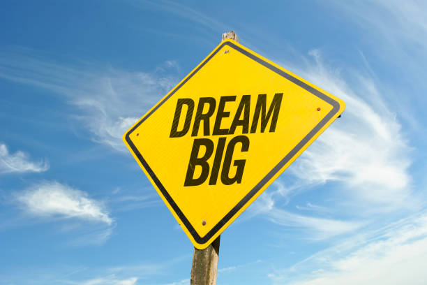 Dream Big Dream Big road sign wanted signal stock pictures, royalty-free photos & images