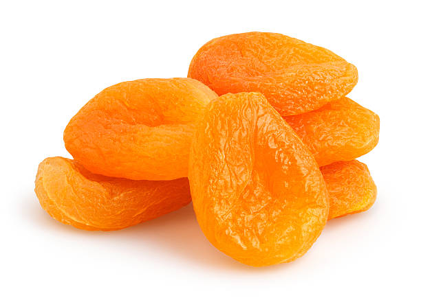 dried apricots dried apricots isolated on white dried food photos stock pictures, royalty-free photos & images