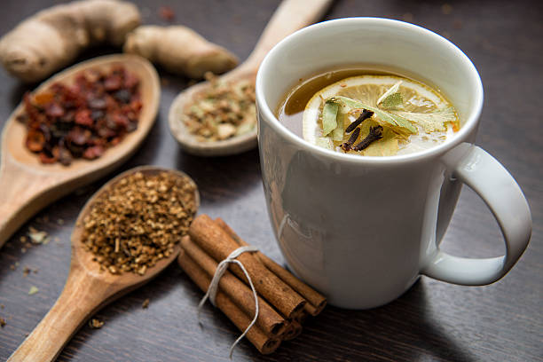 Dried Herbs With Cup Of Herbal Tea stock photo