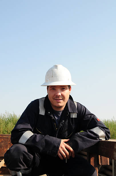 Drilling Rig worker stock photo
