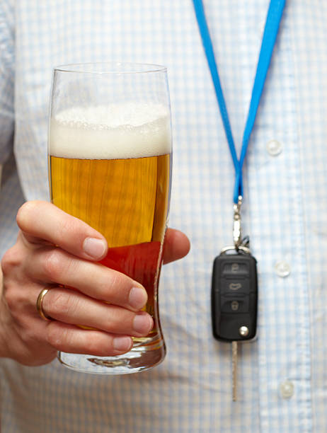Drinking Beer and Driving Car stock photo