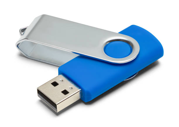 USB Drive Blue USB Thumb Drive with Copy Space Isolated on White Background. usb cable stock pictures, royalty-free photos & images