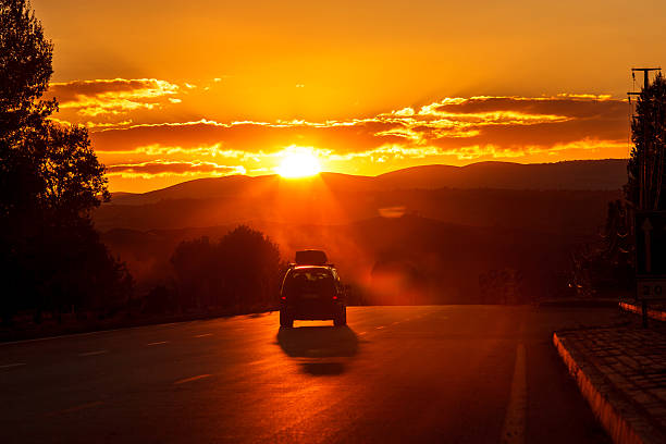 Drive to sunset stock photo