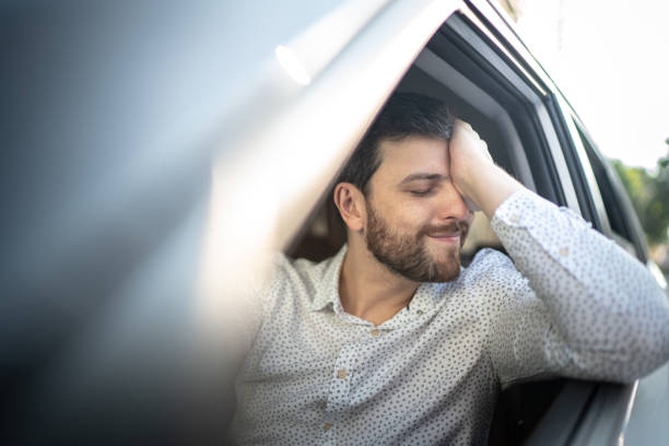 Driver feeling bar at traffic Driver feeling bar at traffic uncomfortable photos stock pictures, royalty-free photos & images