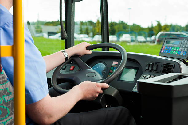 Driver sitting in his bus stock photo