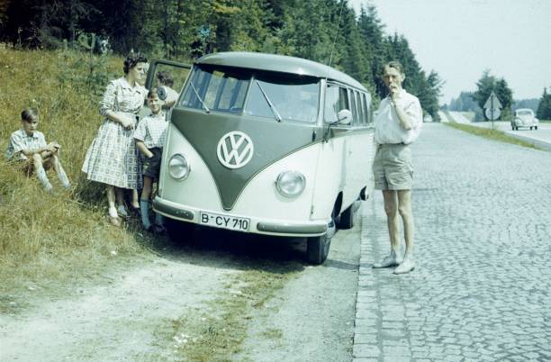 Driving break on a highway Lower Saxony, Germany, 1959. A family interrupts their journey to take a break. germany photos stock pictures, royalty-free photos & images