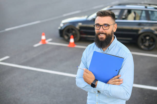 Driving instructor stock photo