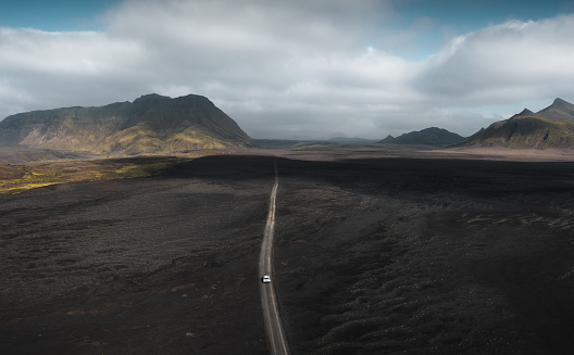 View from above on gravel road (F-road) through the Highlands of Iceland. Drone point of view.