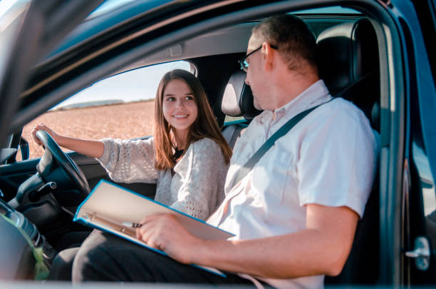 Driving school lesson in vehicle stock photo