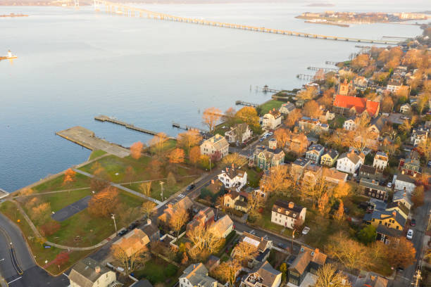 Drone aerial view of Newport Phode Island old tradition building with ocean and yatch port with street summer season Drone aerial view of Newport Phode Island old tradition building with ocean and yatch port with street summer season williamsburg virginia stock pictures, royalty-free photos & images