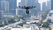 istock Drone flying over construction site 1362508171