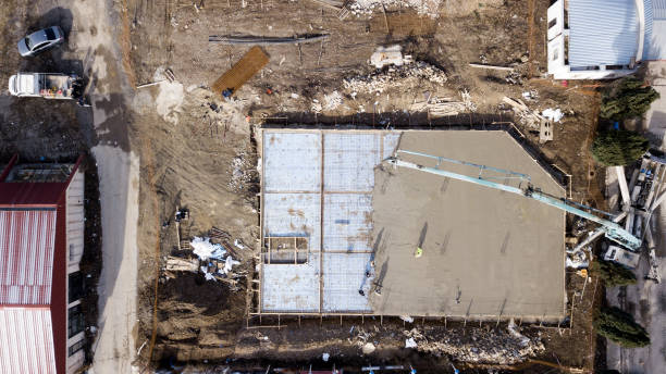 drone image, aerial wiev of a construction site during pouring cement, stock photo