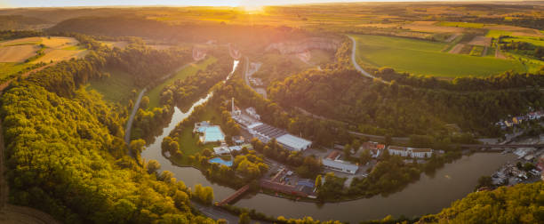 drone photo of the Neckar valley at sunset drone photo of the Neckar valley at sunset rottenburg am neckar stock pictures, royalty-free photos & images