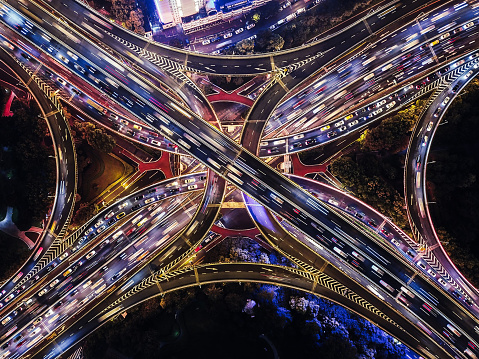 Aerial View of Overpass and City Traffic at Night / Shanghai, China