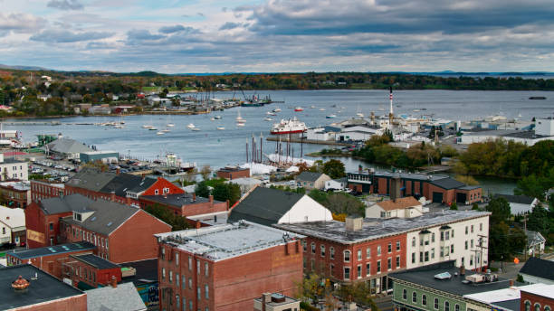 Drone Shot of Harbor in Rockland, Maine Drone shot of Rockland, a small fishing town in Maine on a sunny morning in Fall. fishing village stock pictures, royalty-free photos & images