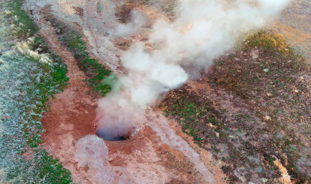 Drone view looking down onto geothermal steam vent in the Nevada Desert. stock photo