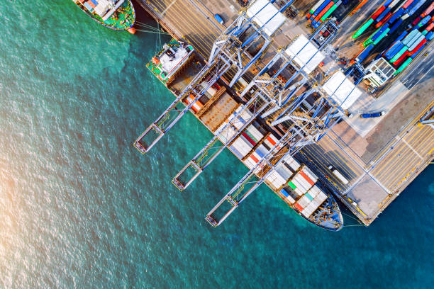 drone view of shipping containers - aerial container ship imagens e fotografias de stock