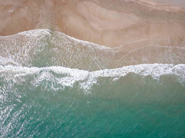 Drone View of Waves Crashing Ashore in Atlantic Beach, North Carolina stock photo