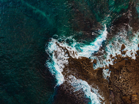 Drone View of Waves Crashing on the Rocks of the Algarve Cliffs, Portugal