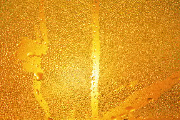 drops on the beer bottle stock photo