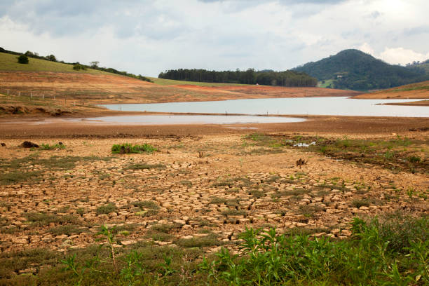 Drought soil in brazilian cantareira dam stock photo