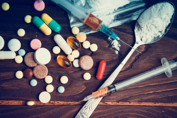 Drug concept. Use illicit Drug abuse .Addiction heroin.Injection, doping. Opium epidemic. Toning, selective focus. Drug concept. Use illicit Drug abuse .Addiction heroin.Injection, doping. Opium epidemic. Toning, selective focus. recreational drug stock pictures, royalty-free photos & images