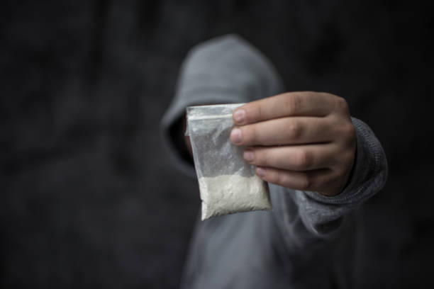 Drug dealer with cocaine drug powder bag Cocaine, Heroin, Narcotic, Medicine cocaine stock pictures, royalty-free photos & images