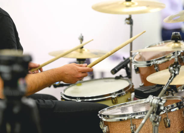 Drummer playing the drums stock photo